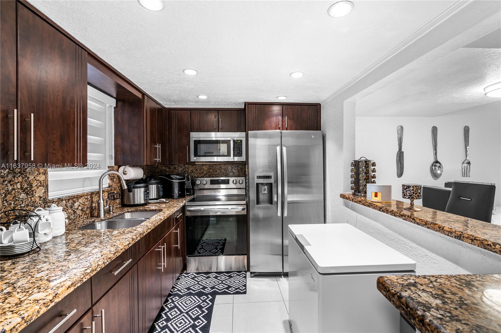 9371 Fontainebleau Boulevard, Unit I235 Miami, FL 33172 - Photo 9 of 23