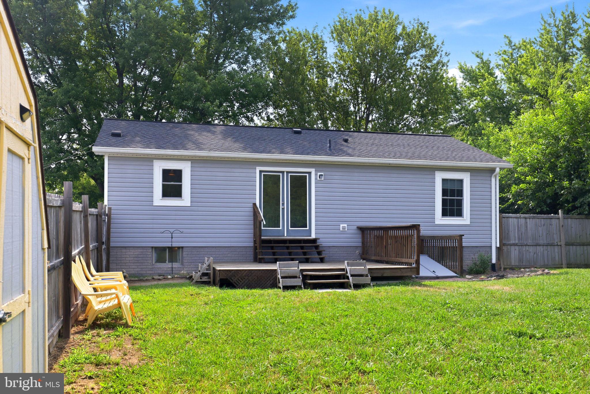 Charming backyard retreat awaits you.
