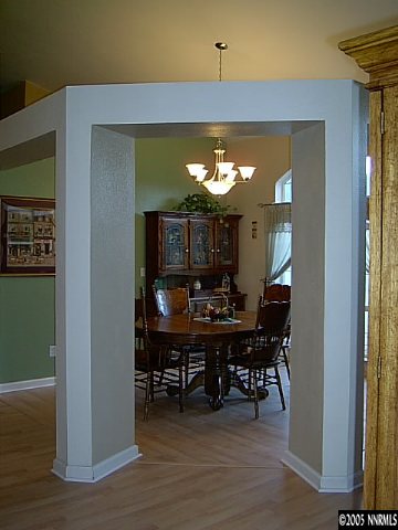 2420 Grizzley Road Reno, NV 89521 - Photo 7 of 9 a view of a dining room with furniture and chandelier