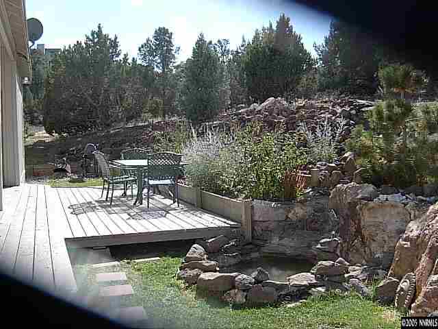 2420 Grizzley Road Reno, NV 89521 - Photo 9 of 9 a view of a backyard with sitting area