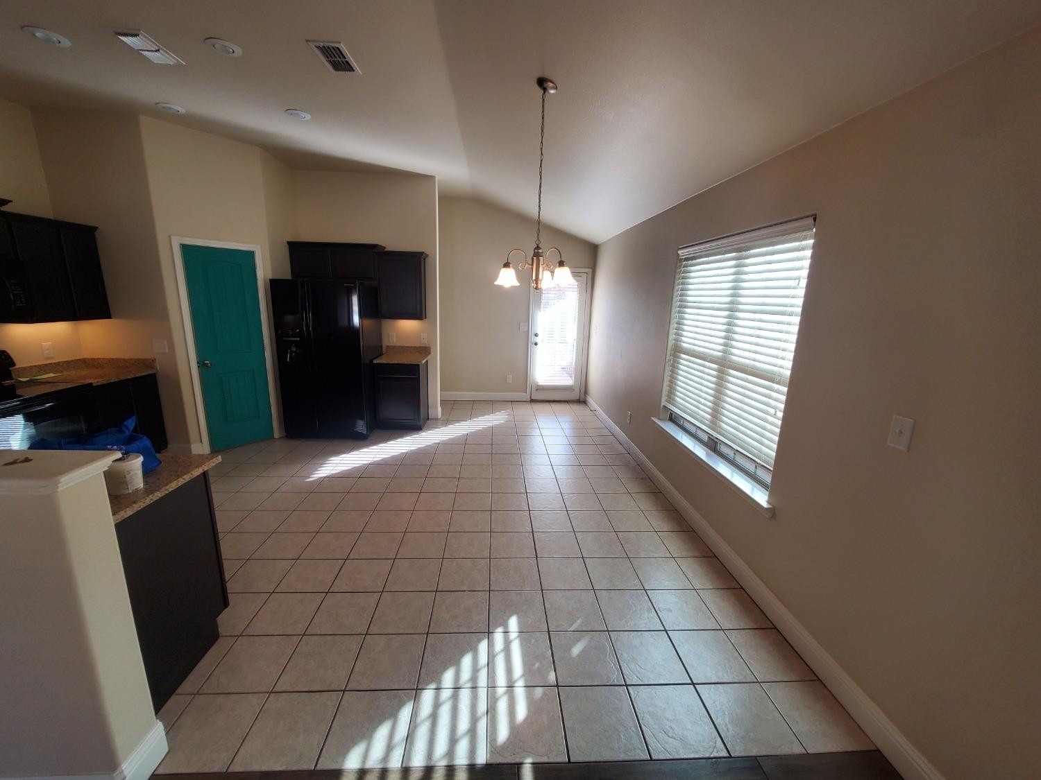 5603 110th Street Lubbock, TX 79424 - Photo 3 of 12 a view of a livingroom with furniture and window