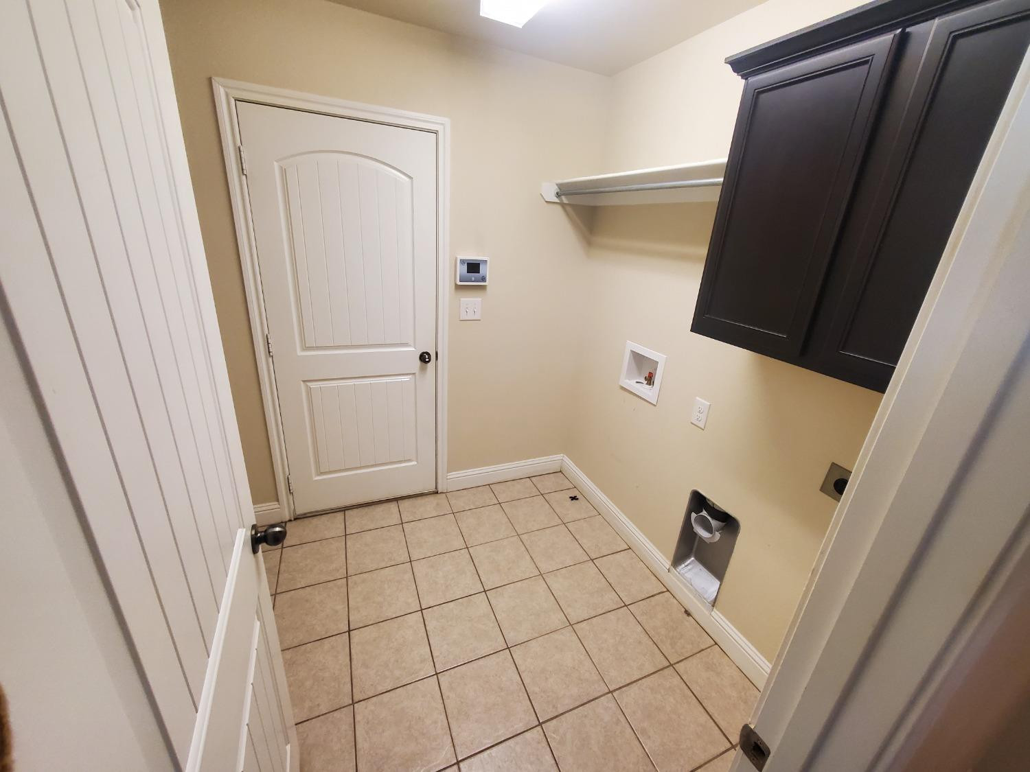 5603 110th Street Lubbock, TX 79424 - Photo 10 of 12 a view of walk in closet