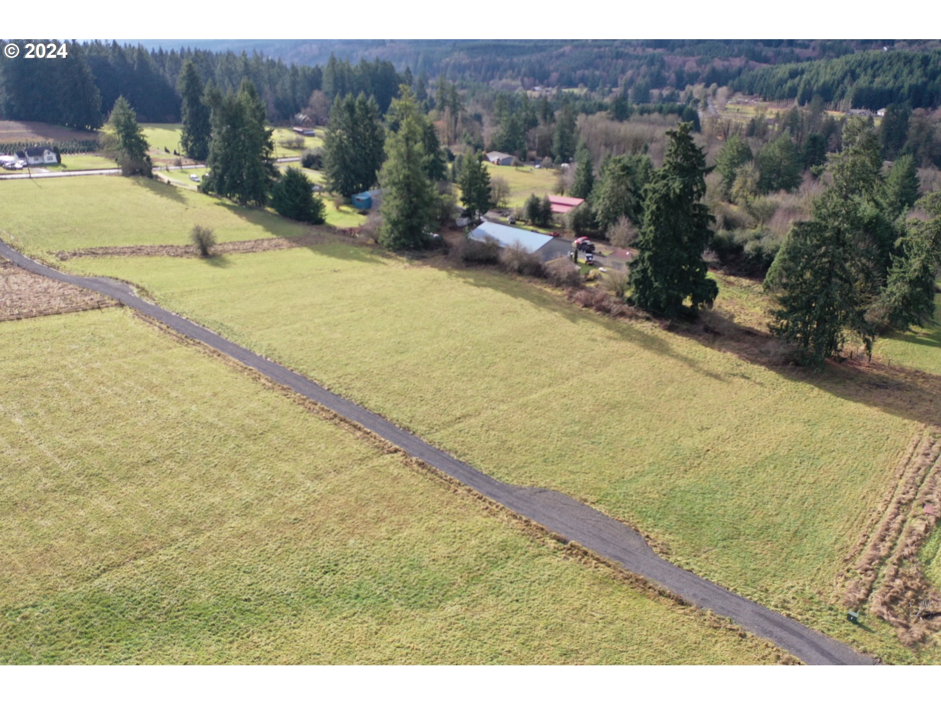 157 Nikula Road Winlock, WA 98596 - Photo 2 of 20 a view of a swimming pool and lounge chair