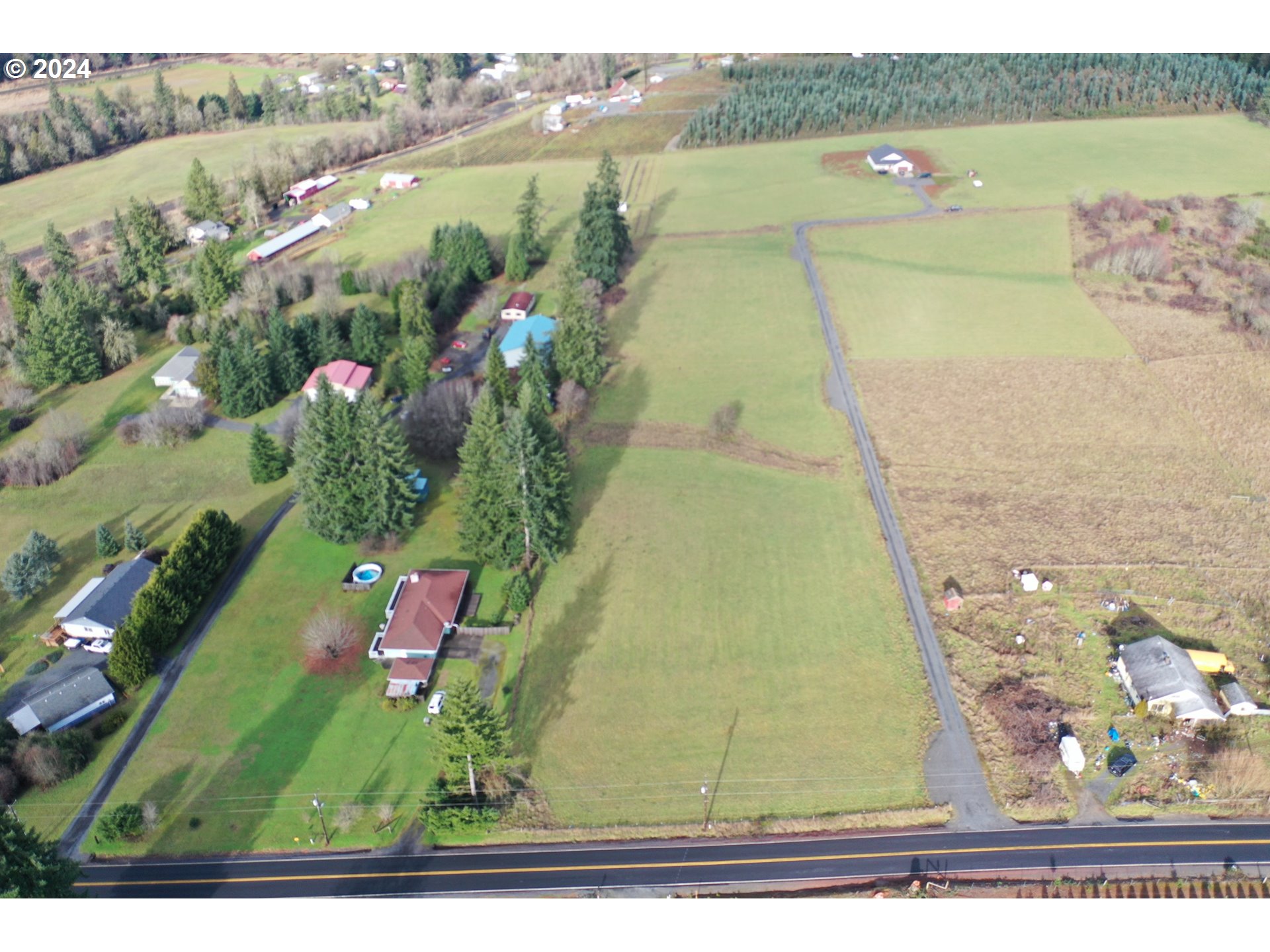 157 Nikula Road Winlock, WA 98596 - Photo 8 of 20 a view of a lake with a outdoor space