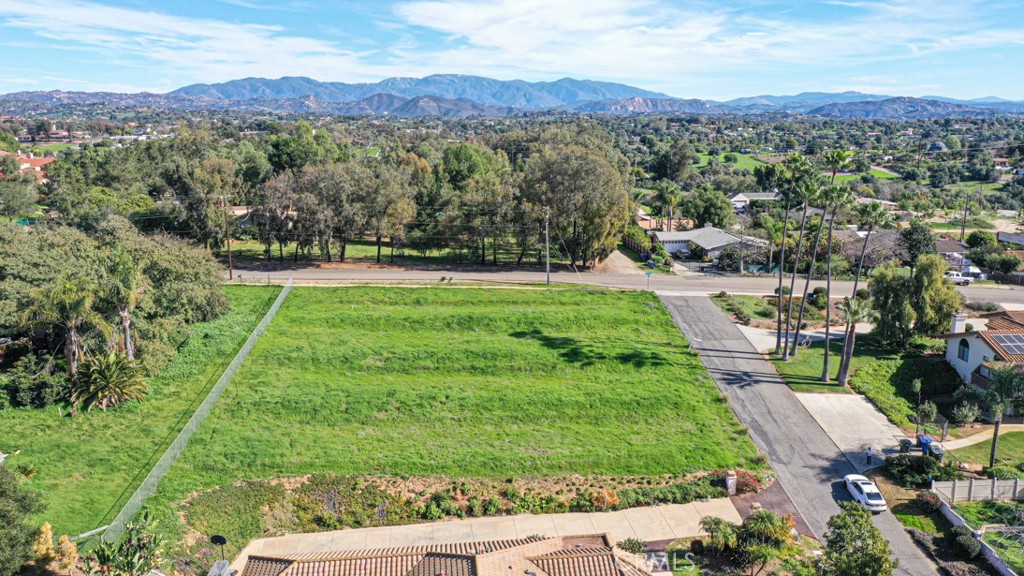1086-88 Snow Creek Road Fallbrook, CA 92028 - Photo 2 of 4 an aerial view of residential houses with outdoor space and trees