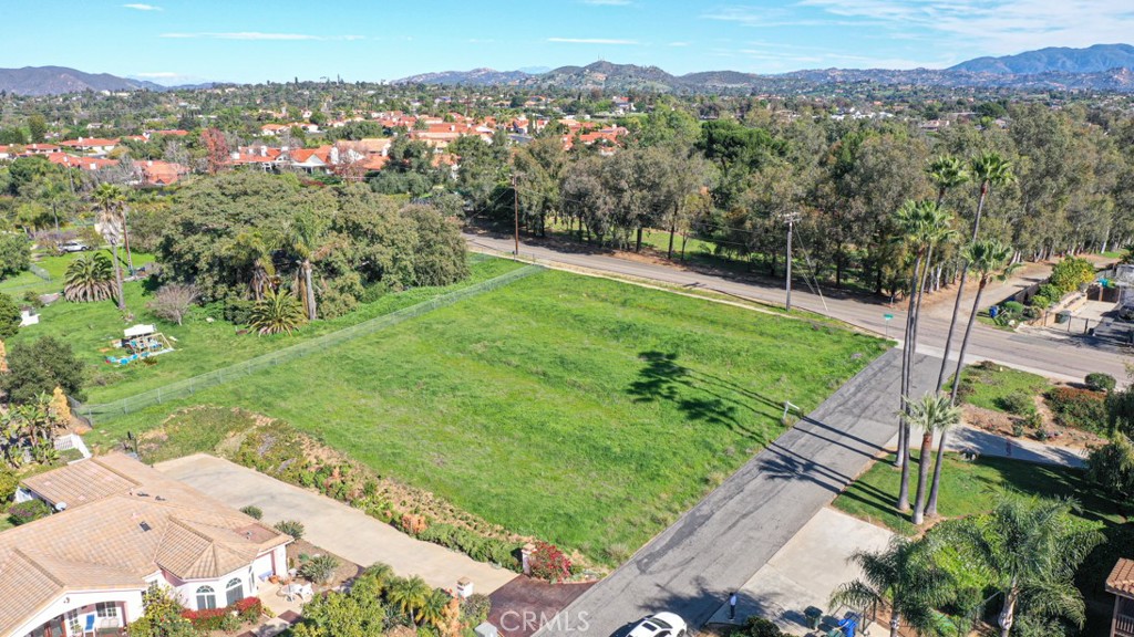 1086-88 Snow Creek Road Fallbrook, CA 92028 - Photo 3 of 4 a view of a lush green hillside and a houses