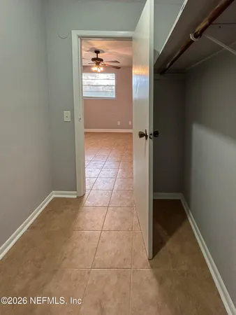 a bathroom with a toilet a sink and bathtub
