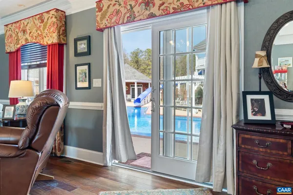 a view of a swimming pool and an outdoor space