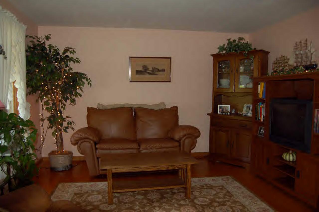 114 Salisbury Road Sheffield, MA 01257 - Photo 5 of 8 a living room with furniture and wooden floor