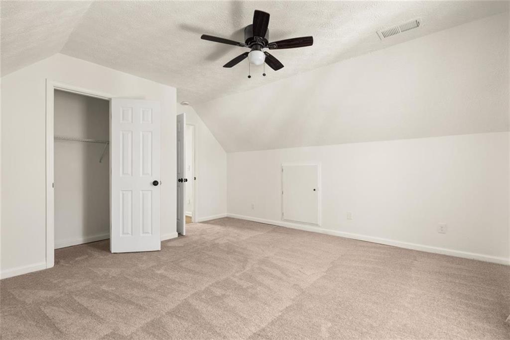 540 Riverside Road Sugar Hill, GA 30518 - Photo 18 of 25 wooden floor in an empty room