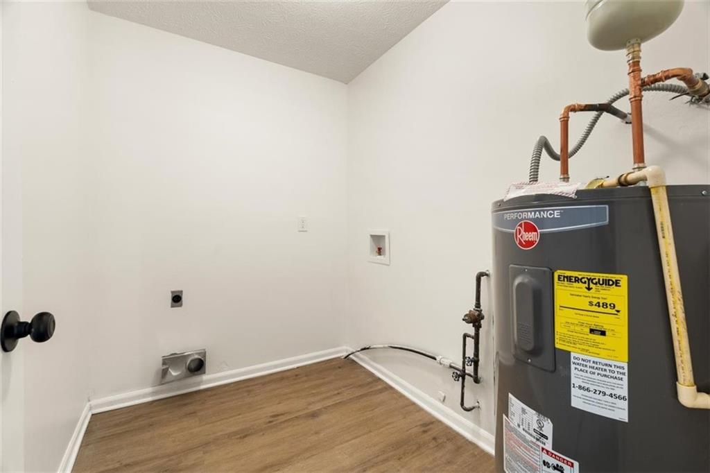 540 Riverside Road Sugar Hill, GA 30518 - Photo 19 of 25 a bathroom with a sink and a mirror