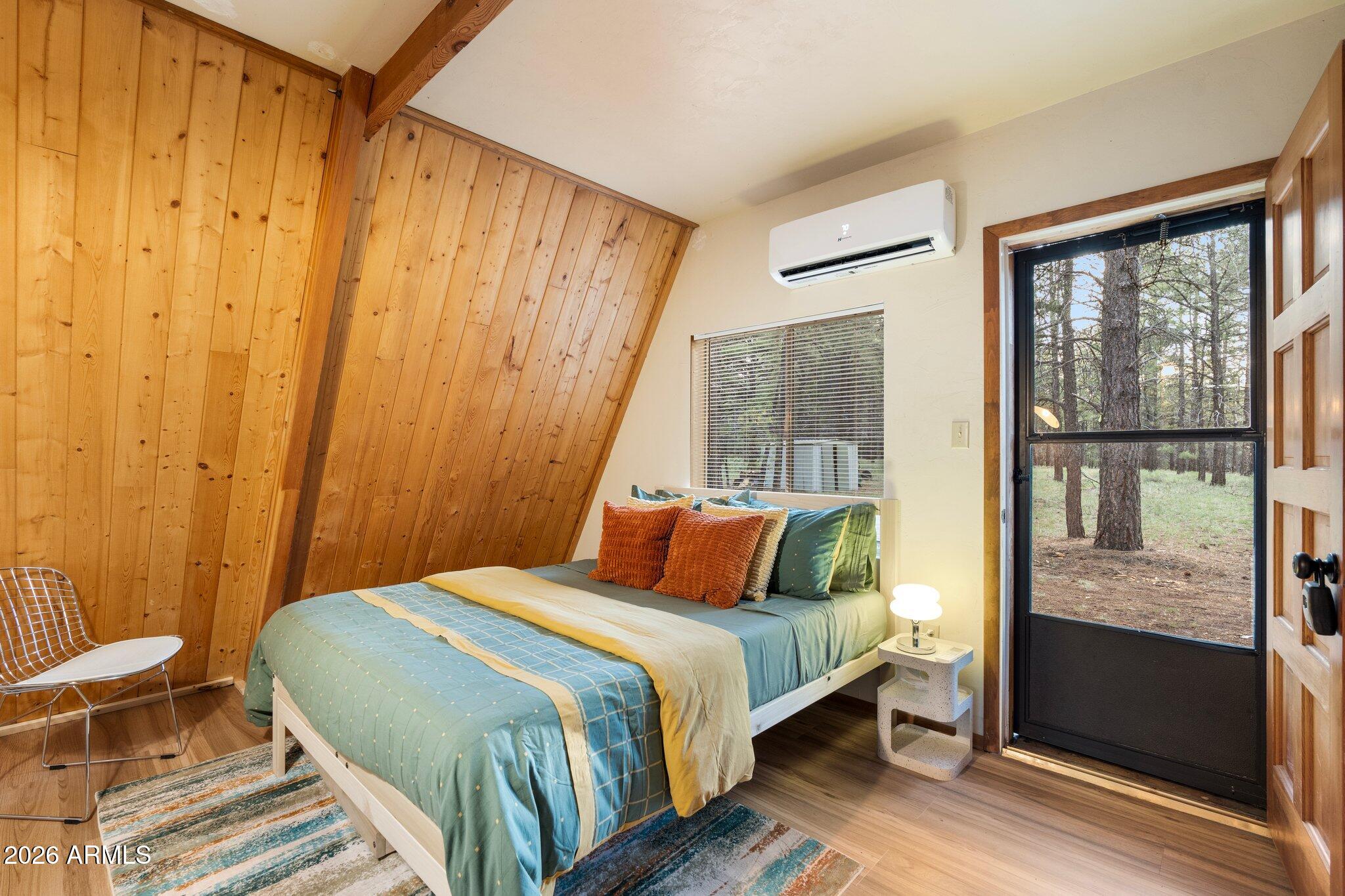 10434 Little Red Road Parks, AZ 86018 - Photo 14 of 35 a bedroom with a bed and a window