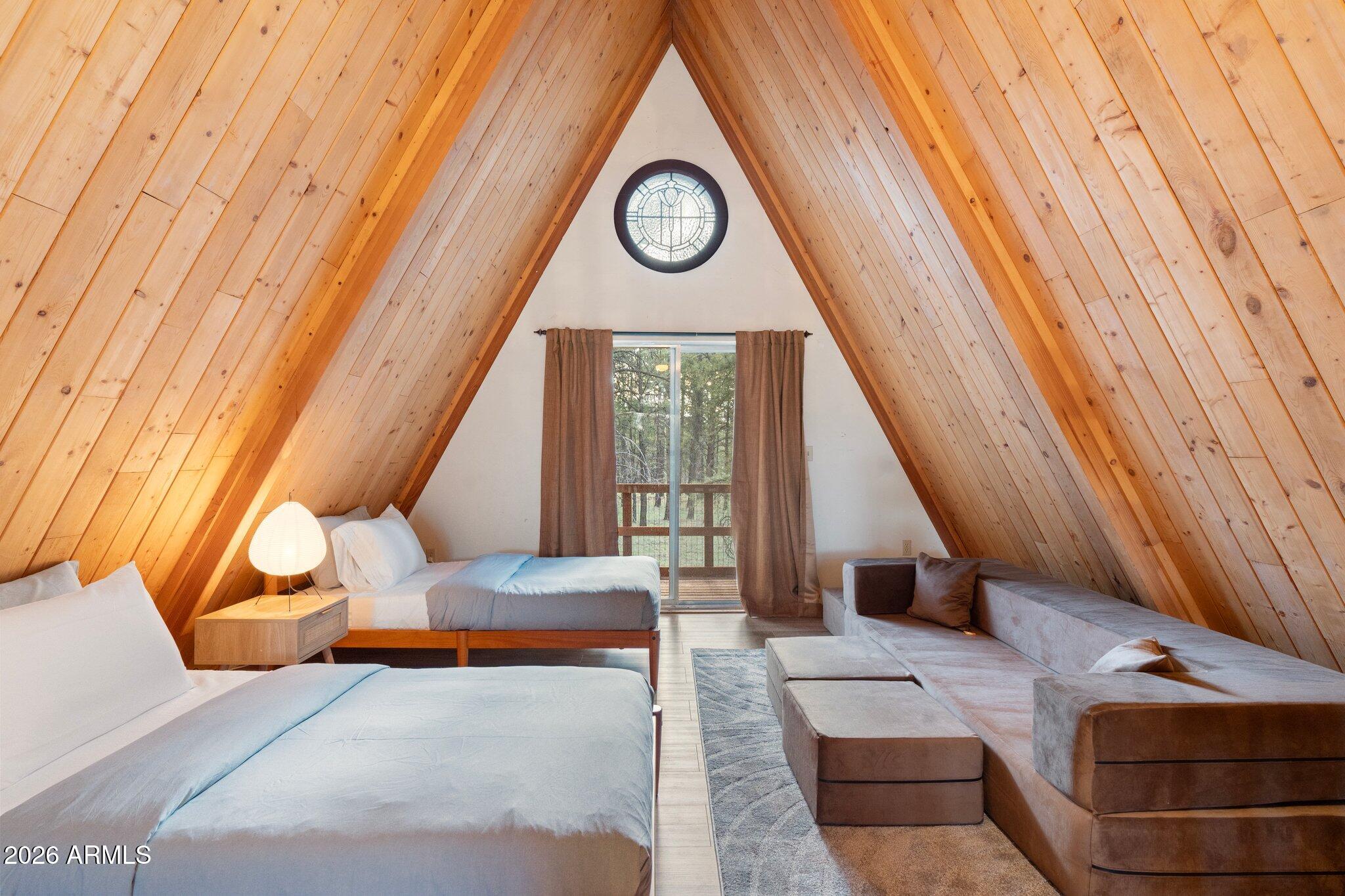 10434 Little Red Road Parks, AZ 86018 - Photo 16 of 35 a living room with furniture and a window