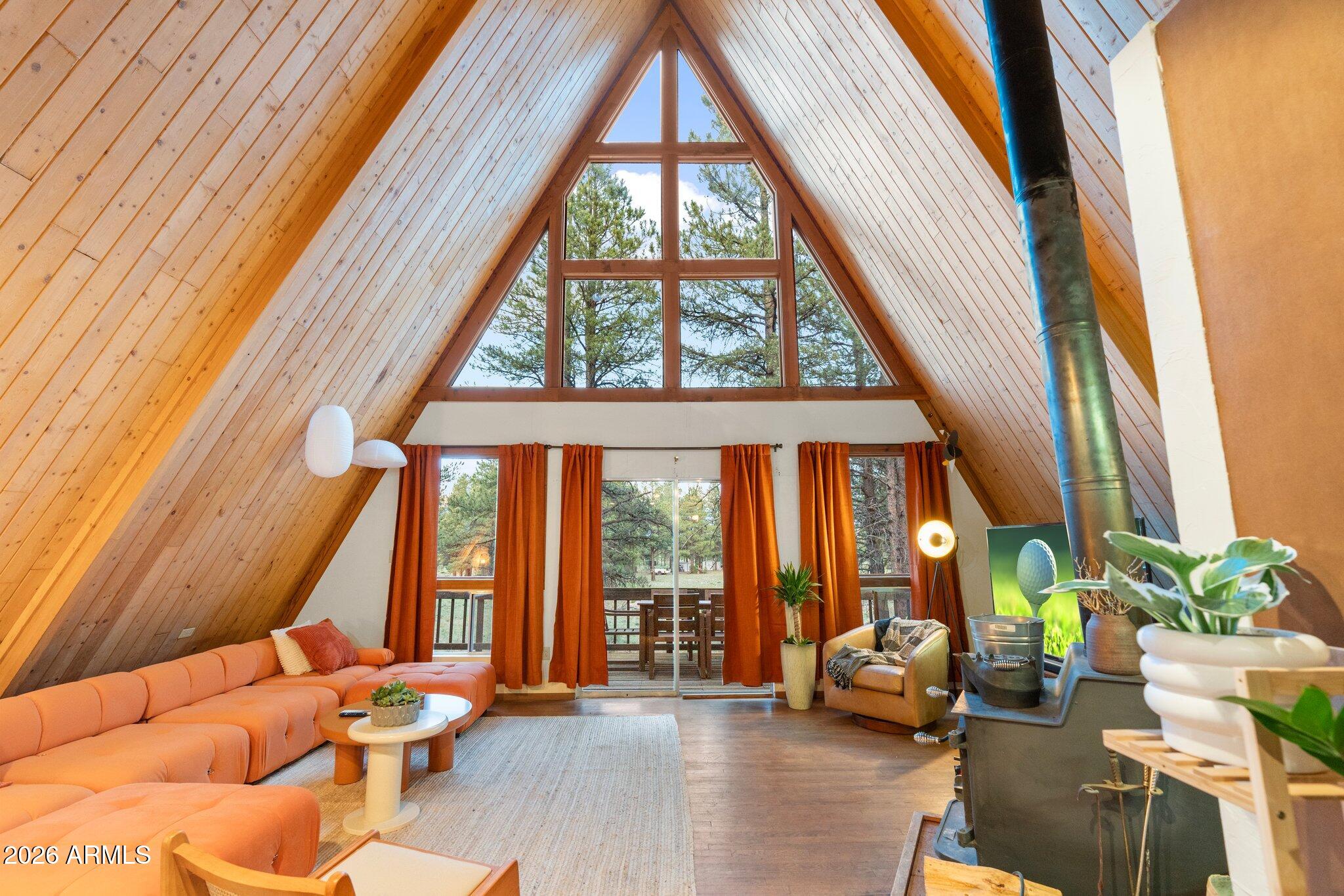 10434 Little Red Road Parks, AZ 86018 - Photo 24 of 35 a living room with furniture and a large window