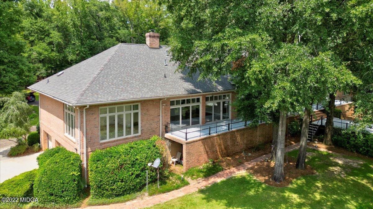 1 River Trace Macon, GA 31210 - Photo 11 of 62 front view of house with a yard and potted plants