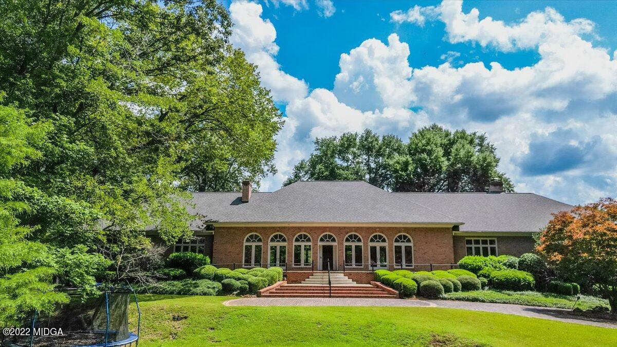 1 River Trace Macon, GA 31210 - Photo 13 of 62 a front view of house with yard and green space