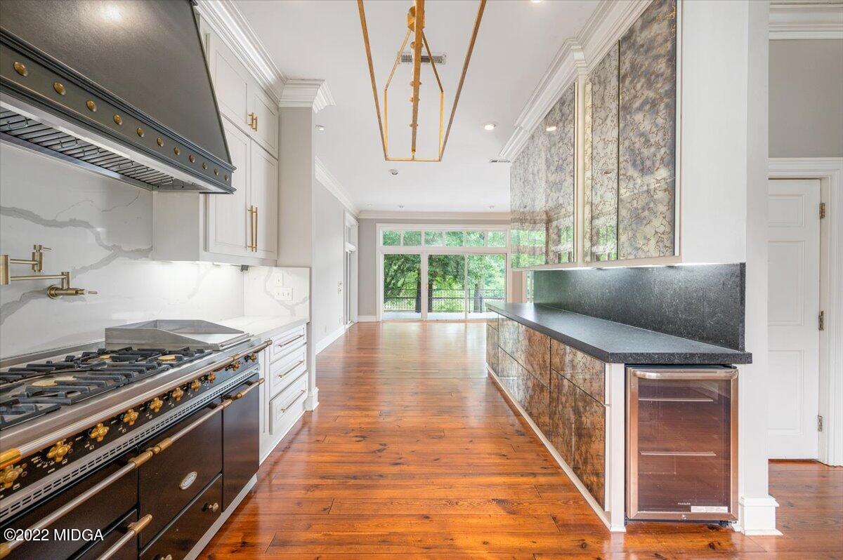 1 River Trace Macon, GA 31210 - Photo 27 of 62 a kitchen with stainless steel appliances a stove a sink and a refrigerator