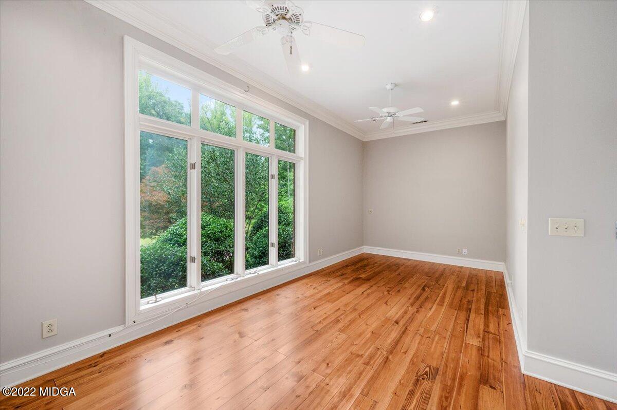 1 River Trace Macon, GA 31210 - Photo 37 of 62 a view of empty room with wooden floor and fan