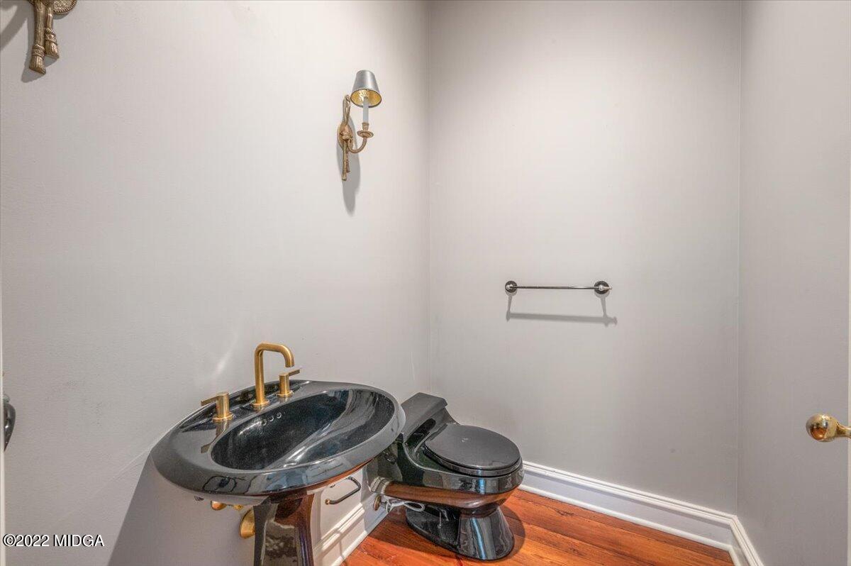 1 River Trace Macon, GA 31210 - Photo 40 of 62 a bathroom with a sink and toilet