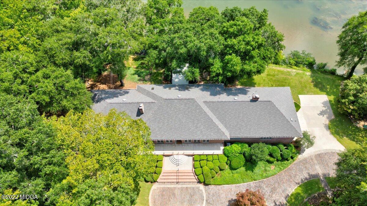 1 River Trace Macon, GA 31210 - Photo 4 of 62 an aerial view of a house with a garden