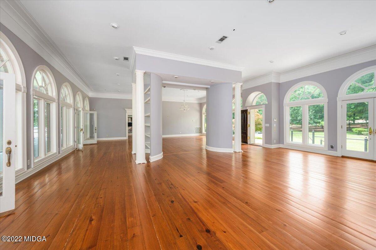 1 River Trace Macon, GA 31210 - Photo 45 of 62 wooden floor in an empty room with a window