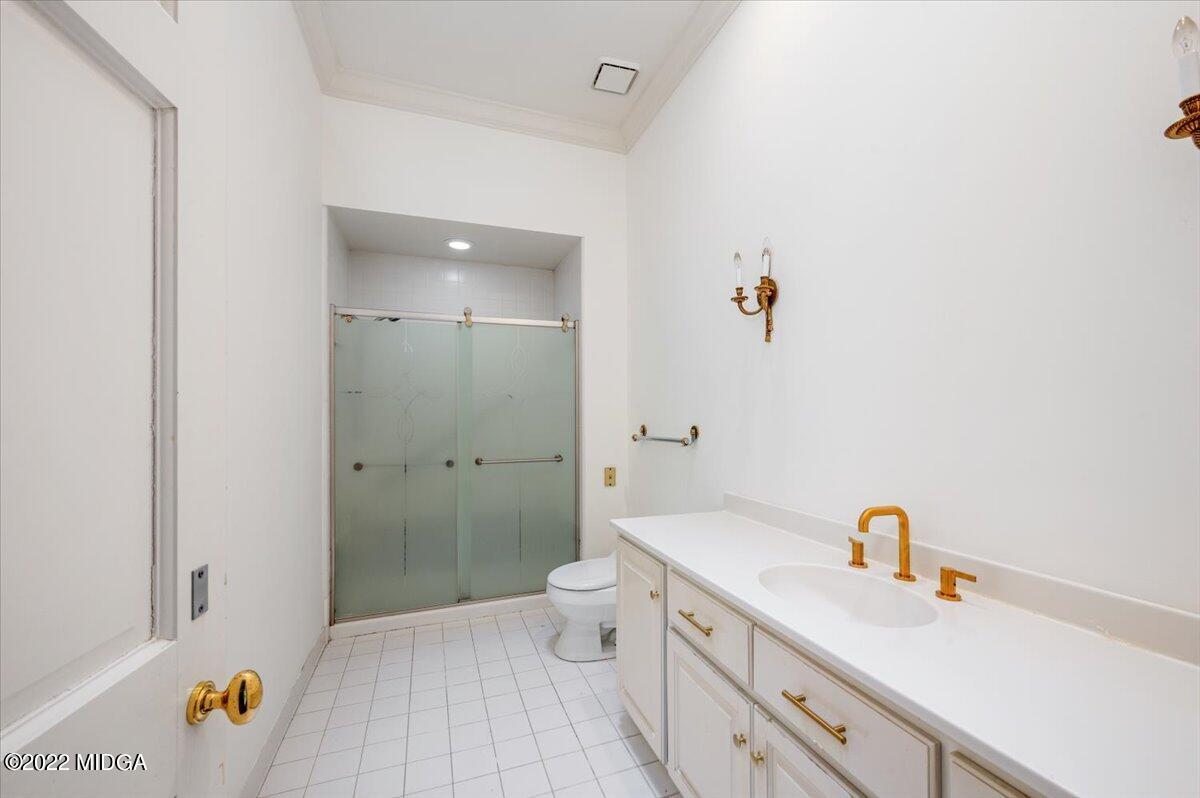 1 River Trace Macon, GA 31210 - Photo 48 of 62 a bathroom with a sink a toilet and shower