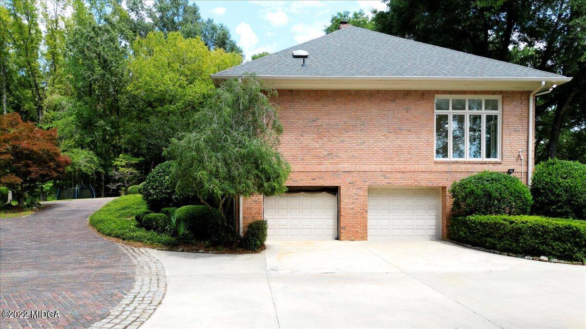 1 River Trace Macon, GA 31210 - Photo 9 of 62 a front view of a house with a yard