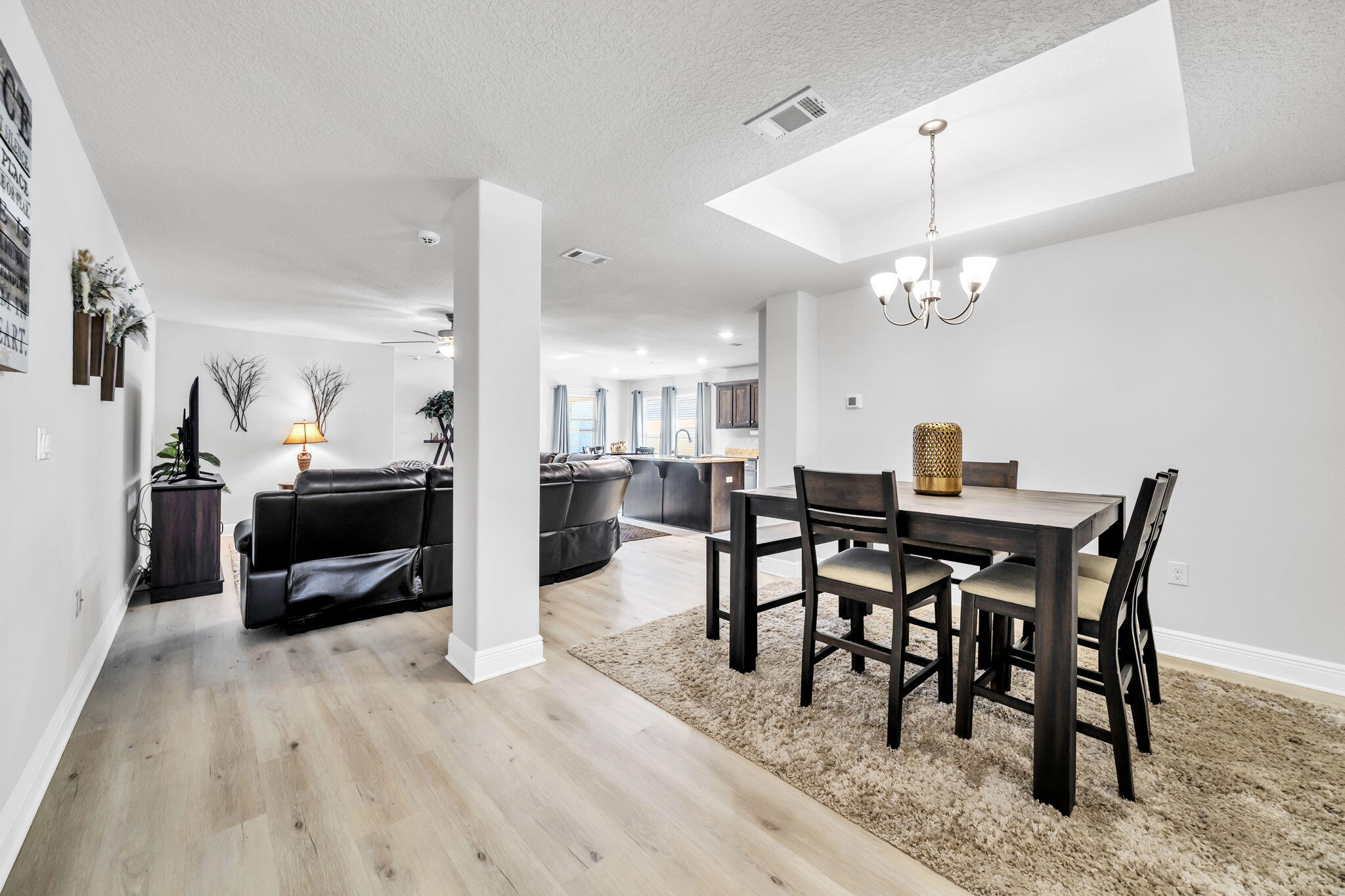 125 Ridgeway Circle Crestview, FL 32536 - Photo 16 of 41 a view of a dining room with furniture and wooden floor