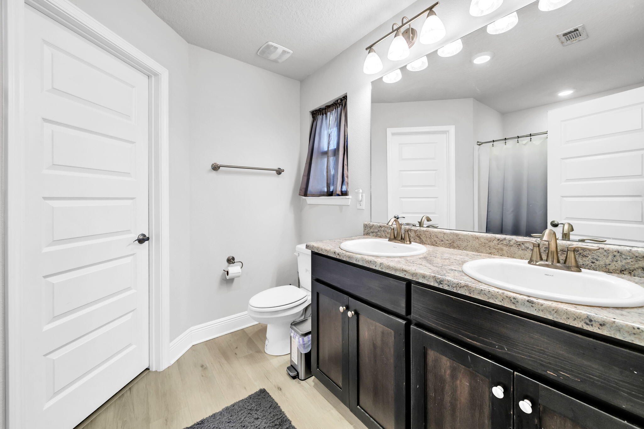 125 Ridgeway Circle Crestview, FL 32536 - Photo 34 of 41 a bathroom with a granite countertop sink toilet and shower