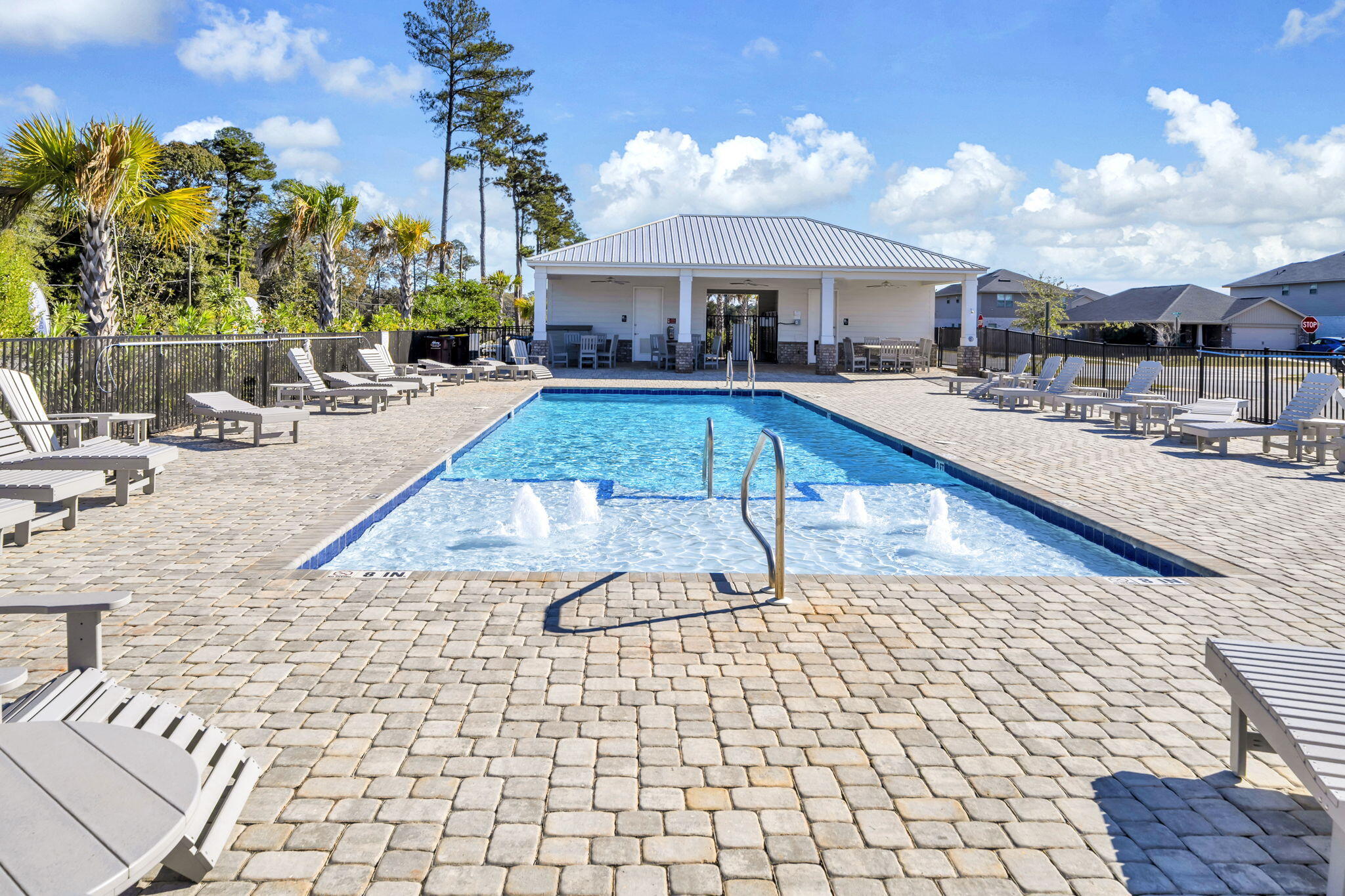 125 Ridgeway Circle Crestview, FL 32536 - Photo 7 of 41 a view of a swimming pool with a patio