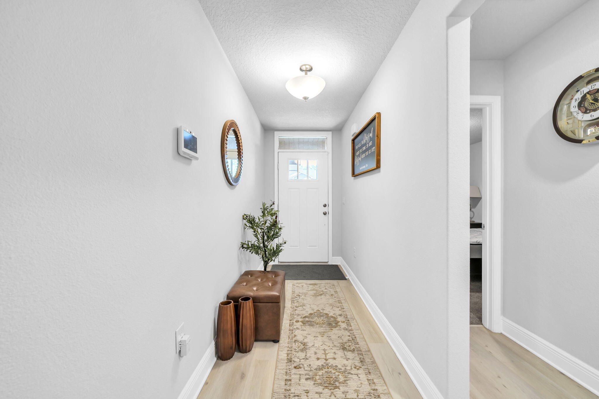 125 Ridgeway Circle Crestview, FL 32536 - Photo 9 of 41 a room with painting on the wall and a table