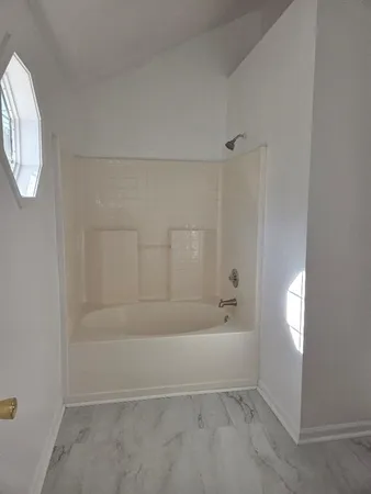a bathroom with a bathtub