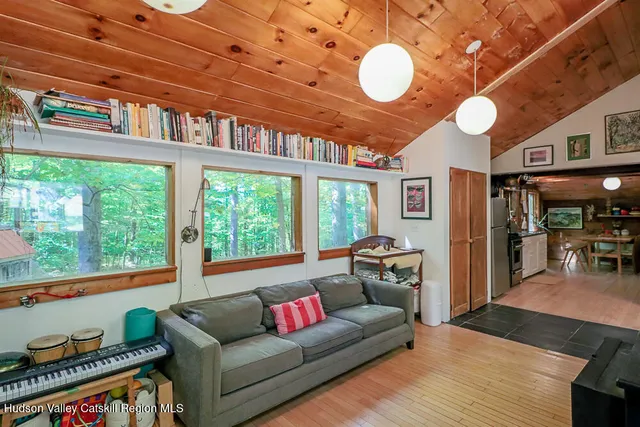 a kitchen with stainless steel appliances granite countertop a refrigerator a stove and a refrigerator