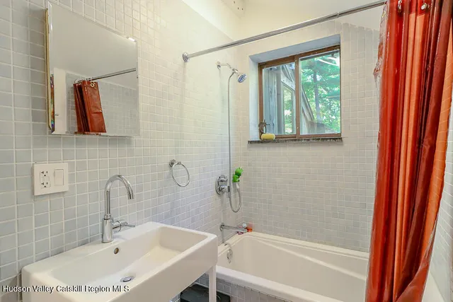 a view of a two chairs in the balcony