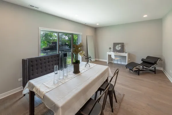 a view of a dining room with furniture window and outside view