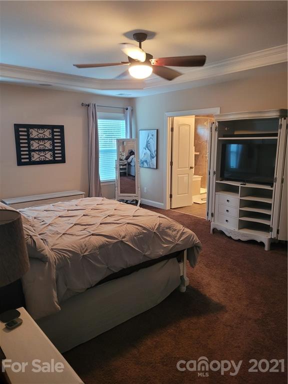 86581 Arrington Road Lancaster, SC 29720 - Photo 4 of 4 a bedroom with a bed and a television