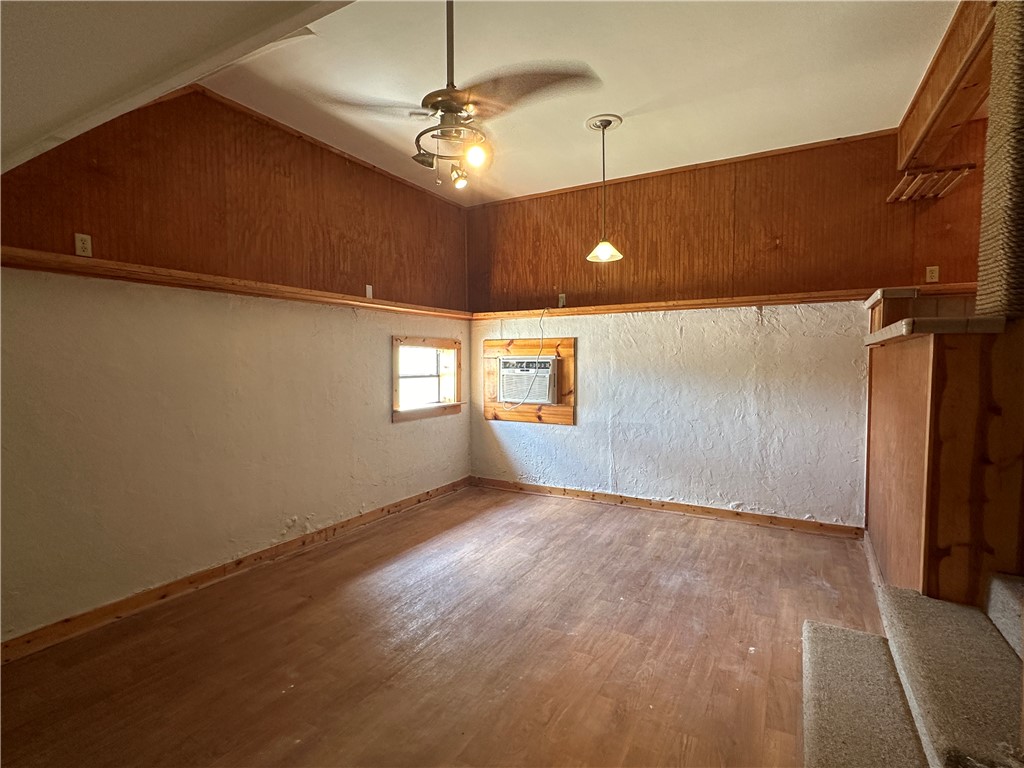 15330 Bowsprit Court Corpus Christi, TX 78418 - Photo 12 of 20 a view of a big room with a ceiling fan and a window