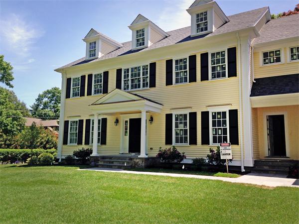 2 Sawyer Road Wellesley, MA 02481 - Photo 2 of 10 a front view of a house with a yard