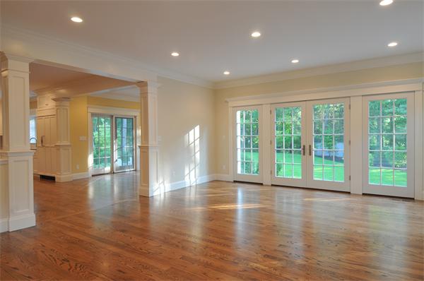 2 Sawyer Road Wellesley, MA 02481 - Photo 9 of 10 a view of an empty room with wooden floor and a window
