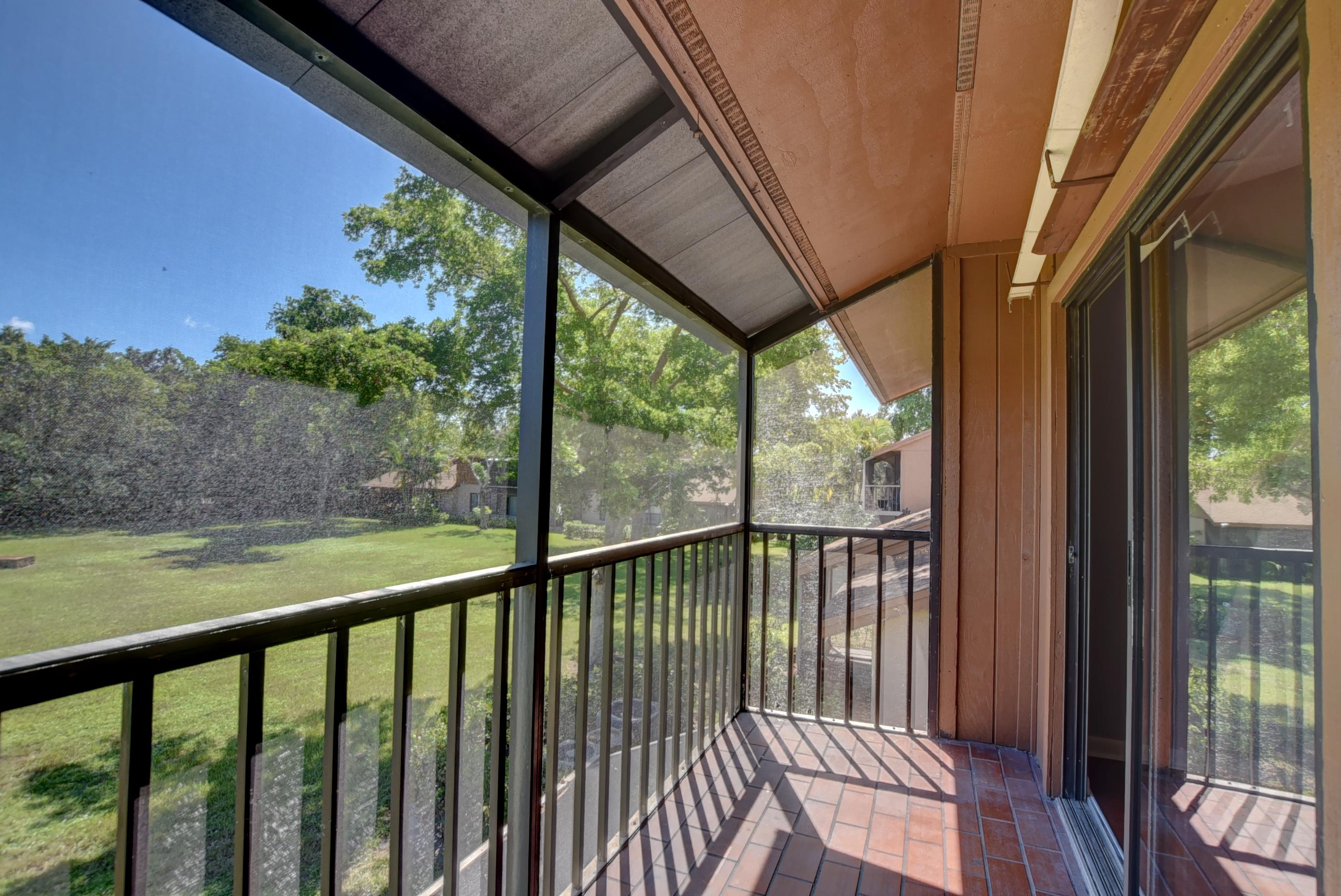 2525 Southwest 22nd Avenue, Unit 202 Delray Beach, FL 33445 - Photo 8 of 32 Covered Patio