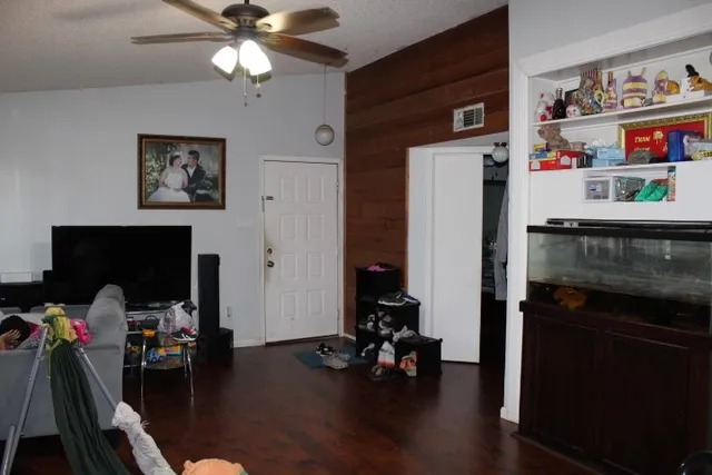 a view of workspace with wooden floor