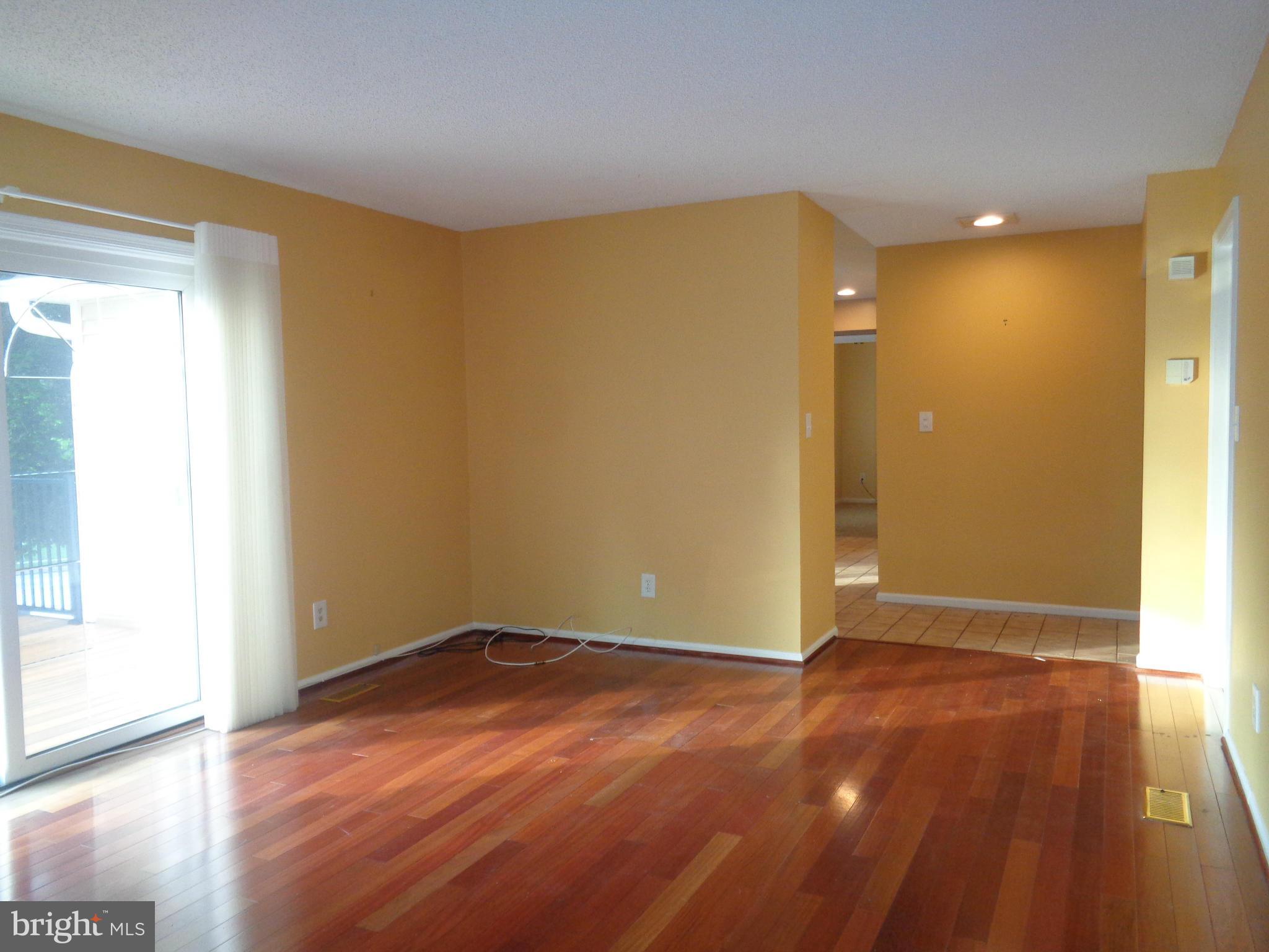 216 Hunters Ridge Road Lutherville-Timonium, MD 21093 - Photo 11 of 22 LARGE FAM ROOM EXIT TO LARGE REPLACED DECK