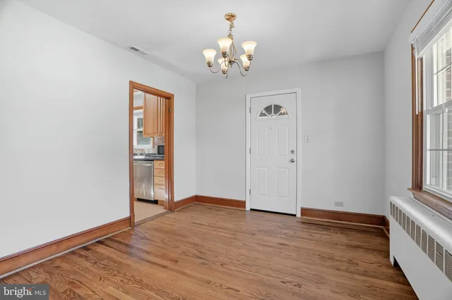 a workspace with furniture and window