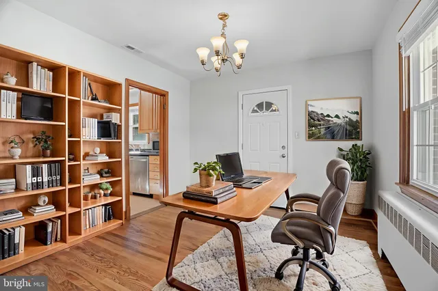 a kitchen with stainless steel appliances a stove sink and cabinets