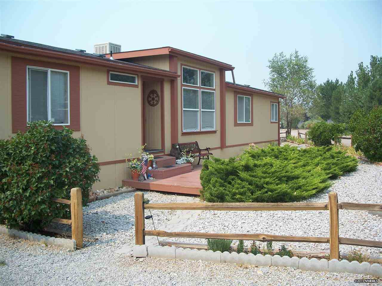 1532 King Lane Reno, NV 89521 - Photo 1 of 1 a front view of a house with garden
