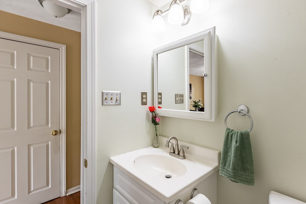 3 Woodland Street, Unit 16 Lawrence, MA 01841 - Photo 17 of 29 a bathroom with a sink and a mirror
