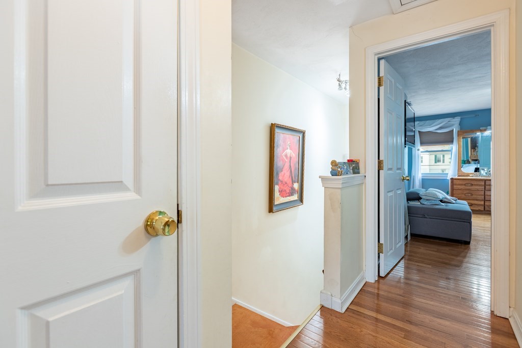 3 Woodland Street, Unit 16 Lawrence, MA 01841 - Photo 18 of 29 a view of hallway with livingroom and couch