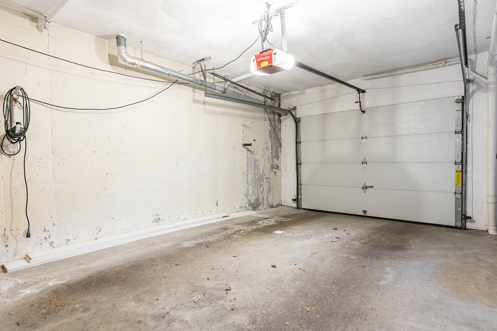 3 Woodland Street, Unit 16 Lawrence, MA 01841 - Photo 26 of 29 a view of a room with racks on the wall