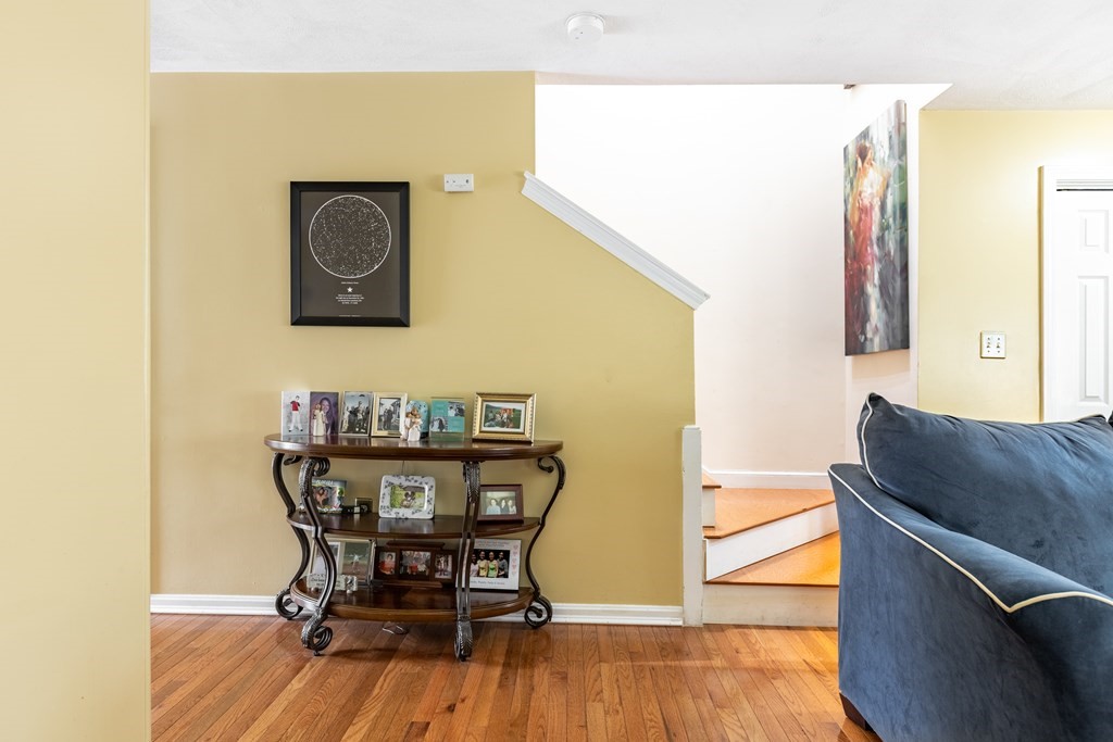 3 Woodland Street, Unit 16 Lawrence, MA 01841 - Photo 7 of 29 a view of a dining room with furniture and wooden floor