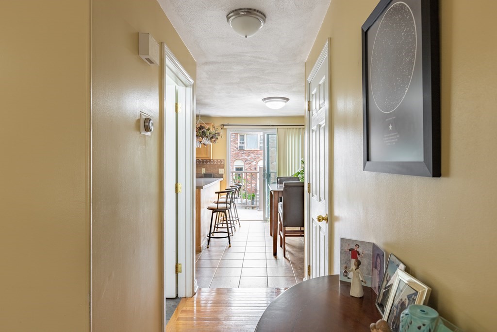3 Woodland Street, Unit 16 Lawrence, MA 01841 - Photo 10 of 29 view of hall way with mirror